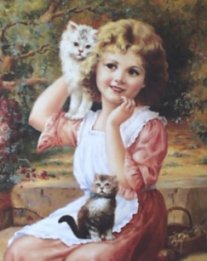 Little girl and kittens